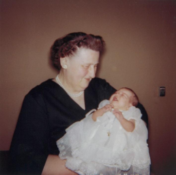 My grandmother holding me on the day I was baptized.